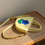 Niche design cream yellow contrast color semicircle flower bag wome summer high-end messenger bag Mart Lion   