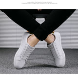 Men's Casual Shoes Lightweight Breathable White Shoes Flat Lace-Up Skateboarding Sneakers Travel Tenis Masculino Mart Lion   