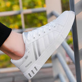 Men's Casual Shoes Lightweight Breathable White Shoes Flat Lace-Up Skateboarding Sneakers Travel Tenis Masculino Mart Lion   