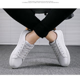 Men's Casual Shoes Lightweight Breathable White Shoes Flat Lace-Up Skateboarding Sneakers Travel Tenis Masculino Mart Lion   